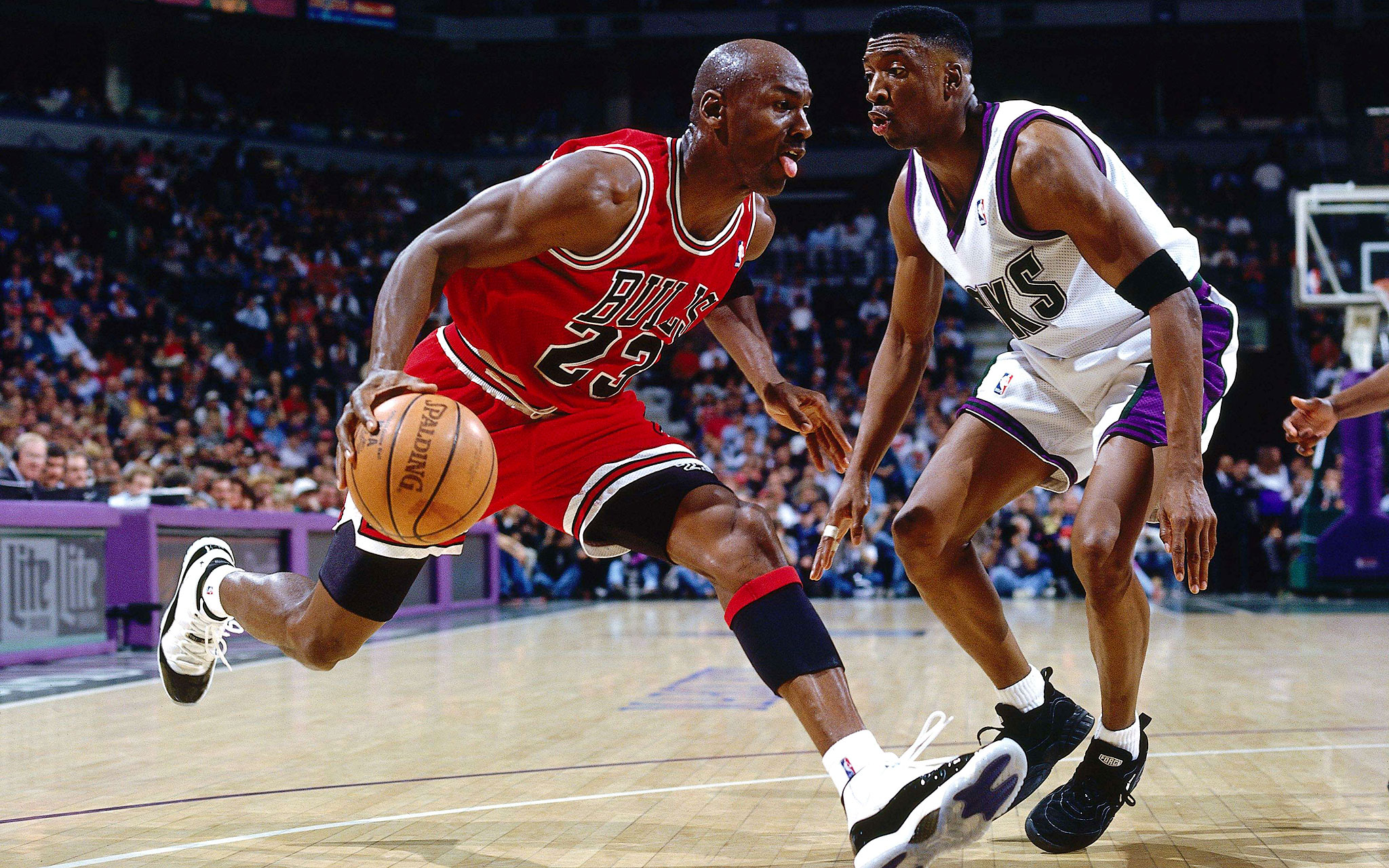 Michael Jordan drives baseline