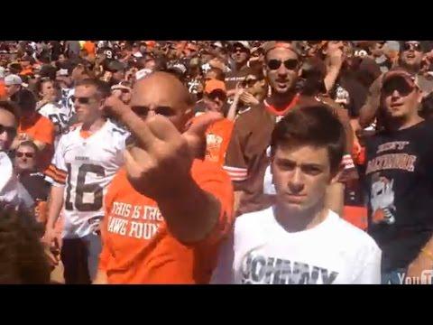 Ravens Fan Celebrates A Touchdown In The Browns “Dawg Pound” Section